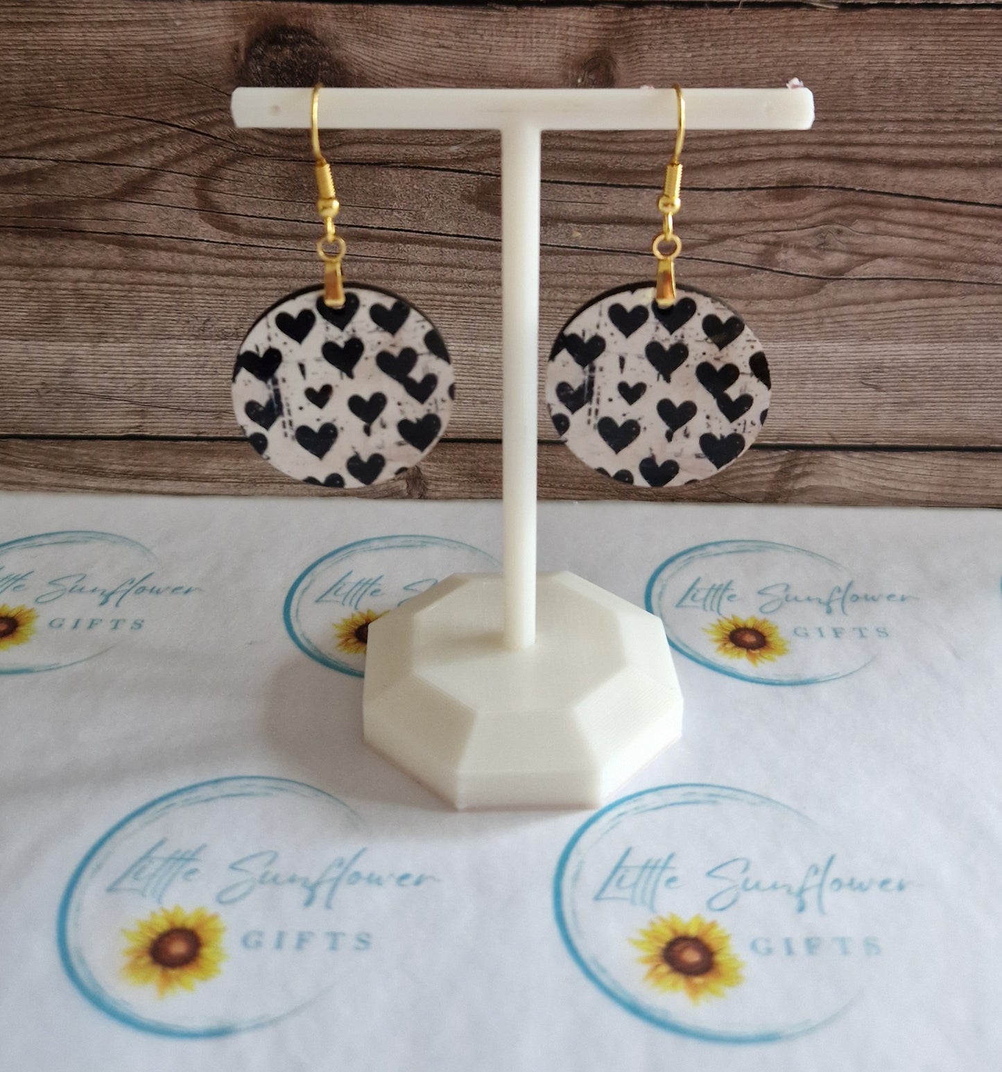 Black paint drip hearts earrings